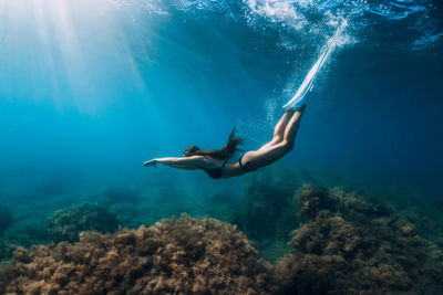 Man swimming in sea