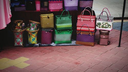 Multi colored wicker basket at store