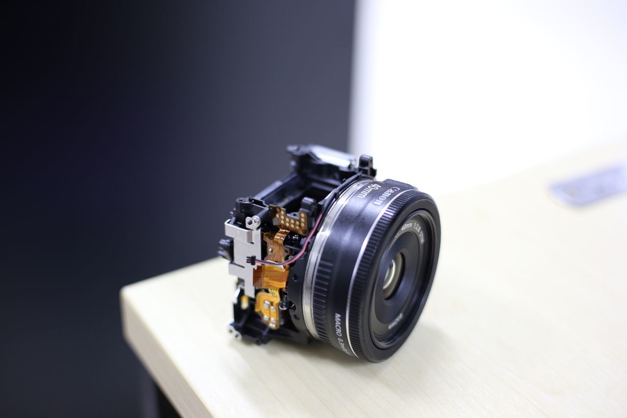 still life, technology, indoors, close-up, no people, photography themes, table, camera - photographic equipment, camera, focus on foreground, photographic equipment, equipment, single object, studio shot, digital camera, toy, lens - optical instrument, toy car, selective focus, black color