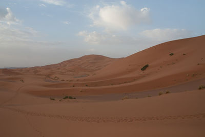 Scenic view of desert against sky