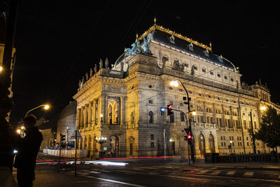 Illuminated buildings in city at night