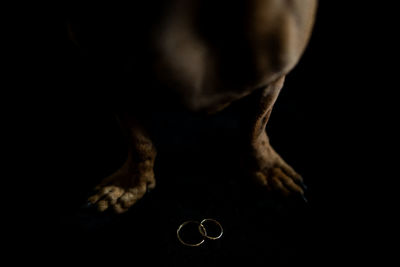 Close-up of human eye against black background