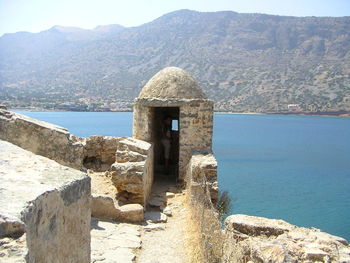 Built structure with mountains in background