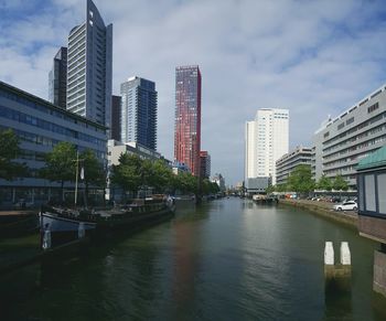 Buildings in city against sky