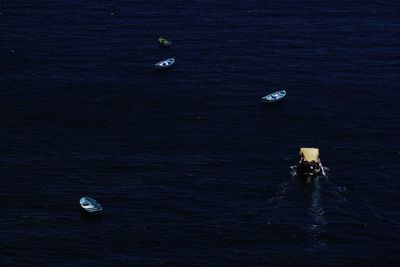 High angle view of boat sailing in sea