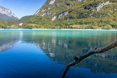 Scenic view of lake against blue sky