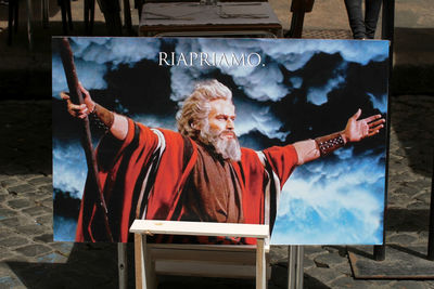 Portrait of man sitting on chair