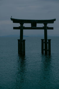 Pier on sea against sky