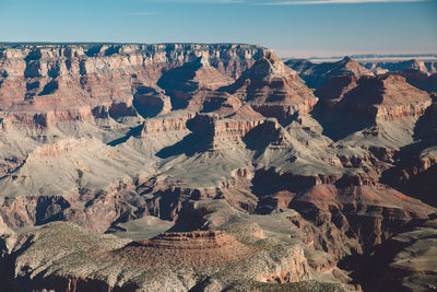 Scenic view of eroded landscape against sky