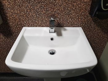 High angle view of faucet in bathroom