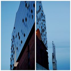 Low angle view of modern building against blue sky