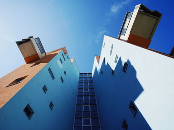 Low angle view of built structure against blue sky