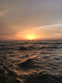 Scenic view of sea against sky during sunset