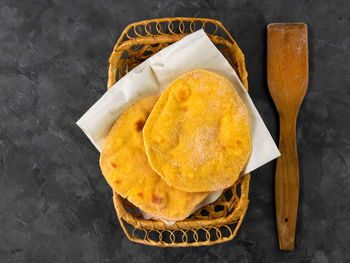 High angle view of bread in basket on table