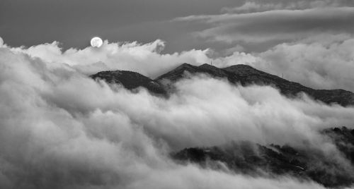 Low angle view of majestic mountains against sky