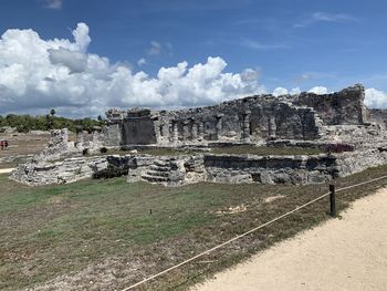 Old ruin building against cloudy sky