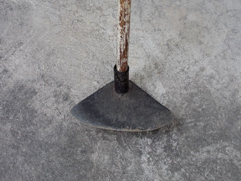 High angle view of chain hanging on wall