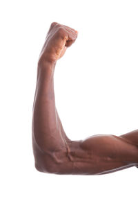 Close-up of hand against white background