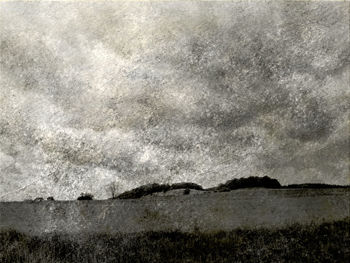 Scenic view of land against sky