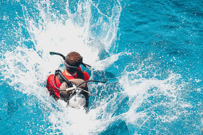 Man surfing in sea