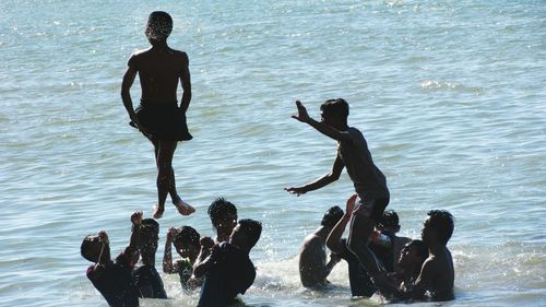 People enjoying in sea