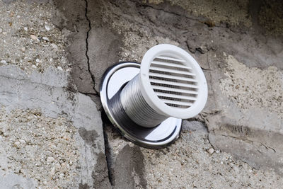 High angle view of pipe on wall