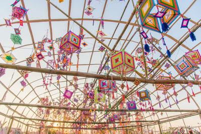 Low angle view of ferris wheel against sky