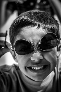 Close-up portrait of boy wearing sunglasses