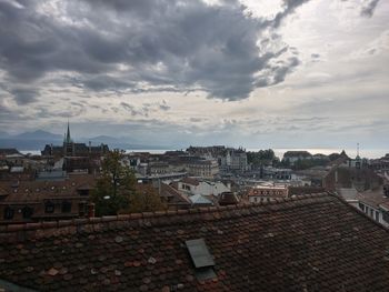 High angle view of buildings in city against sky