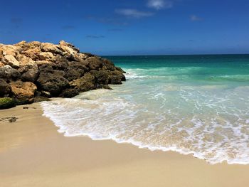 Scenic view of beach against sky