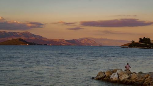 Scenic view of sea against sky during sunset