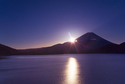 Scenic view of mountains against sky during sunset