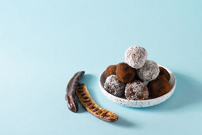 Close-up of cookies against white background