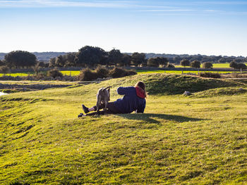 Man sitting on field