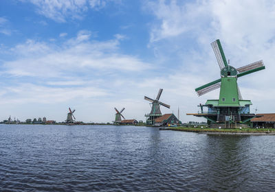 Traditional windmill against sky