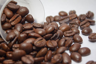 Close-up of coffee beans on table