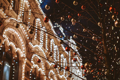 Christmas and new year celebration in moscow. night light shining and glowing near gum