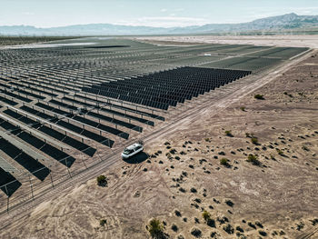 Renewable solar energy solar farm in the desert of southern nevada on a dry lake bed.