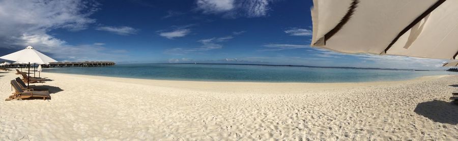 Scenic view of beach against sky