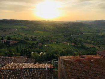 High angle view of townscape against sky during sunset