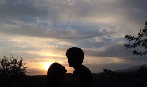 Silhouette of man at sunset