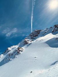 Snow covered mountain against sky