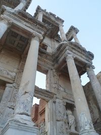 Low angle view of old ruins against sky