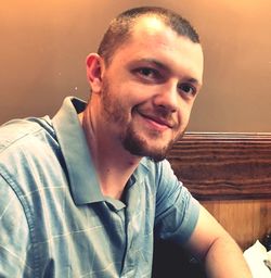 Portrait of young man smiling