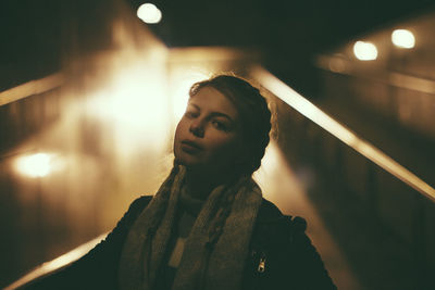 Woman at night in city
