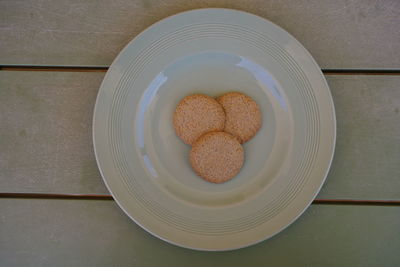 Directly above shot of cookies in plate on table