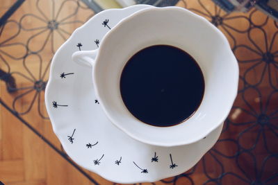 Close-up of coffee cup on table