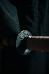 Close-up of hand holding coins