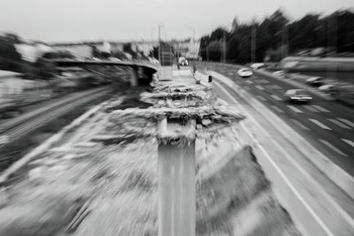 Blurred motion of car on road in city