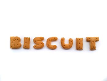 Close-up of cookies against white background